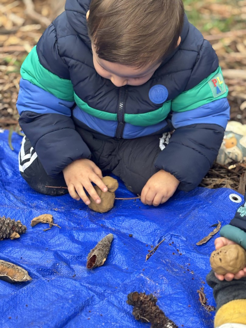 Children in nature-based play therapy session 4
