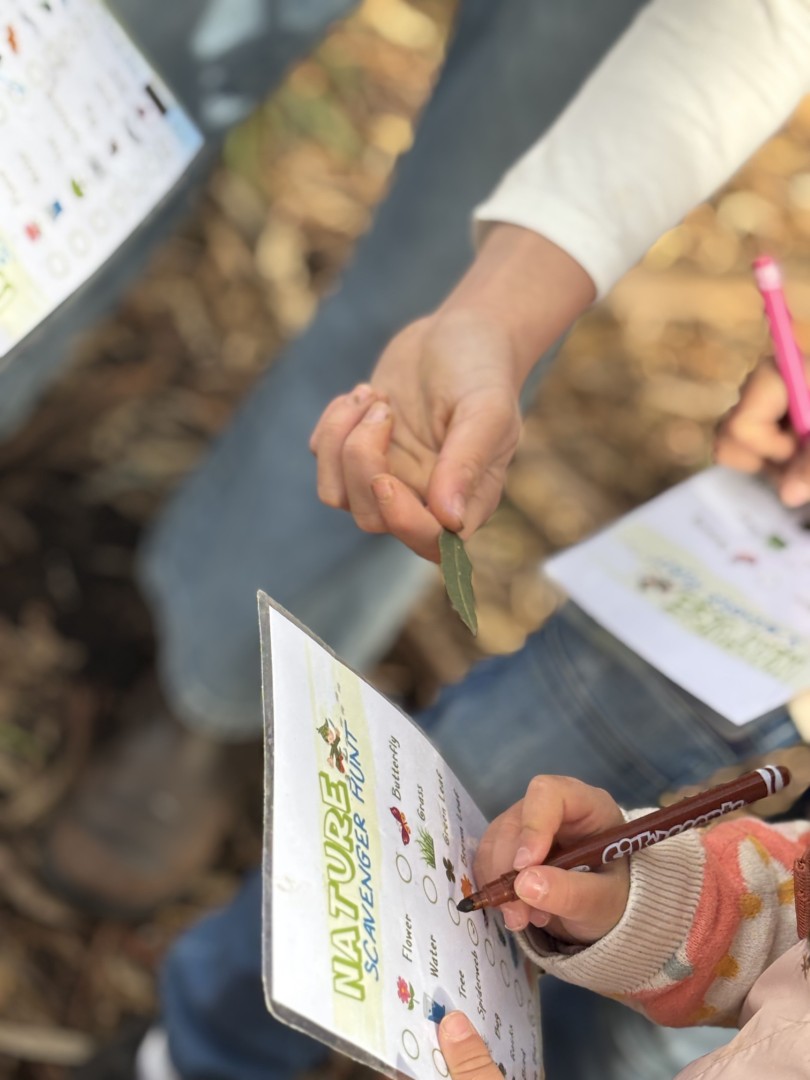 Child engaged in nature-based play therapy
