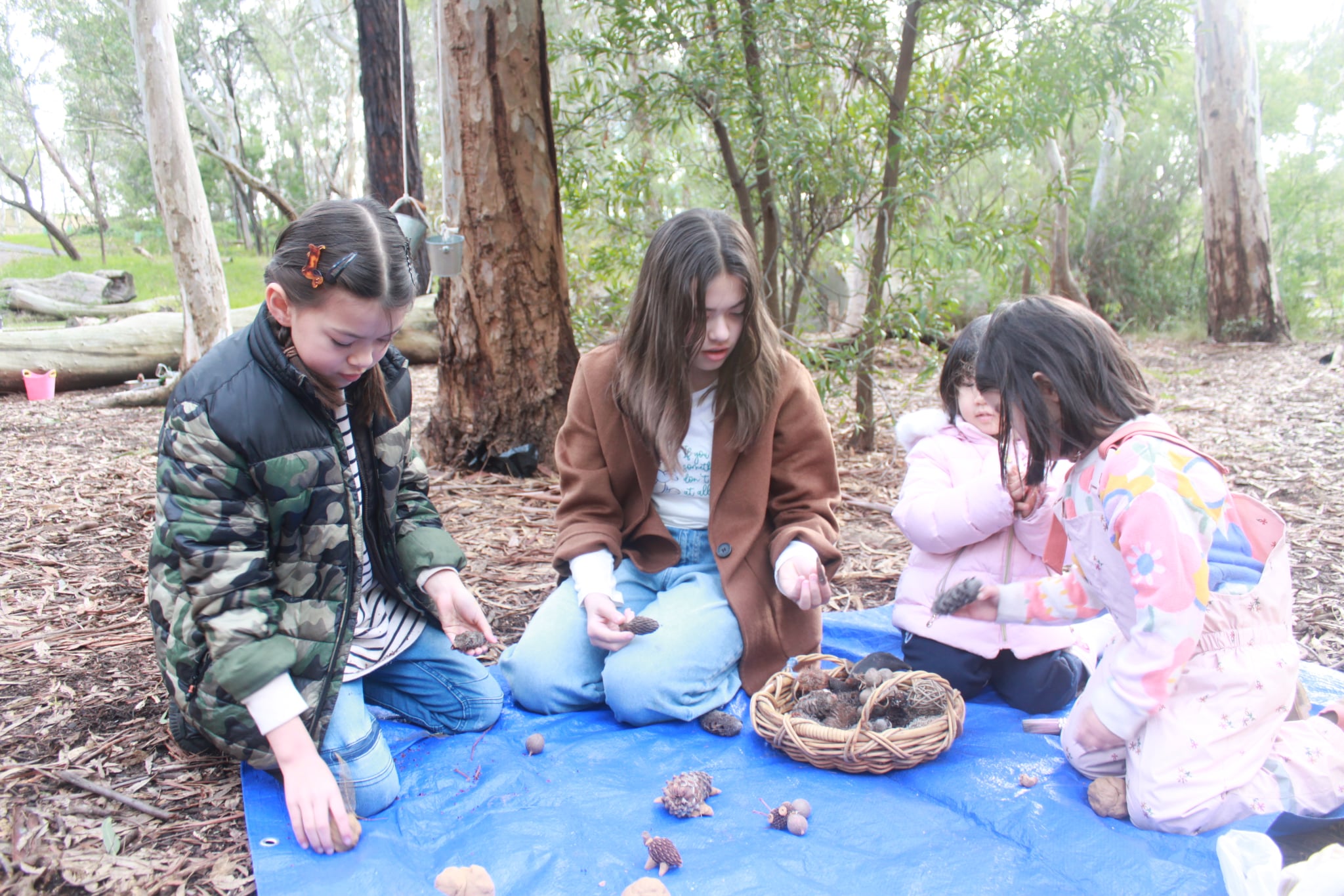 Children in nature-based play therapy session 2